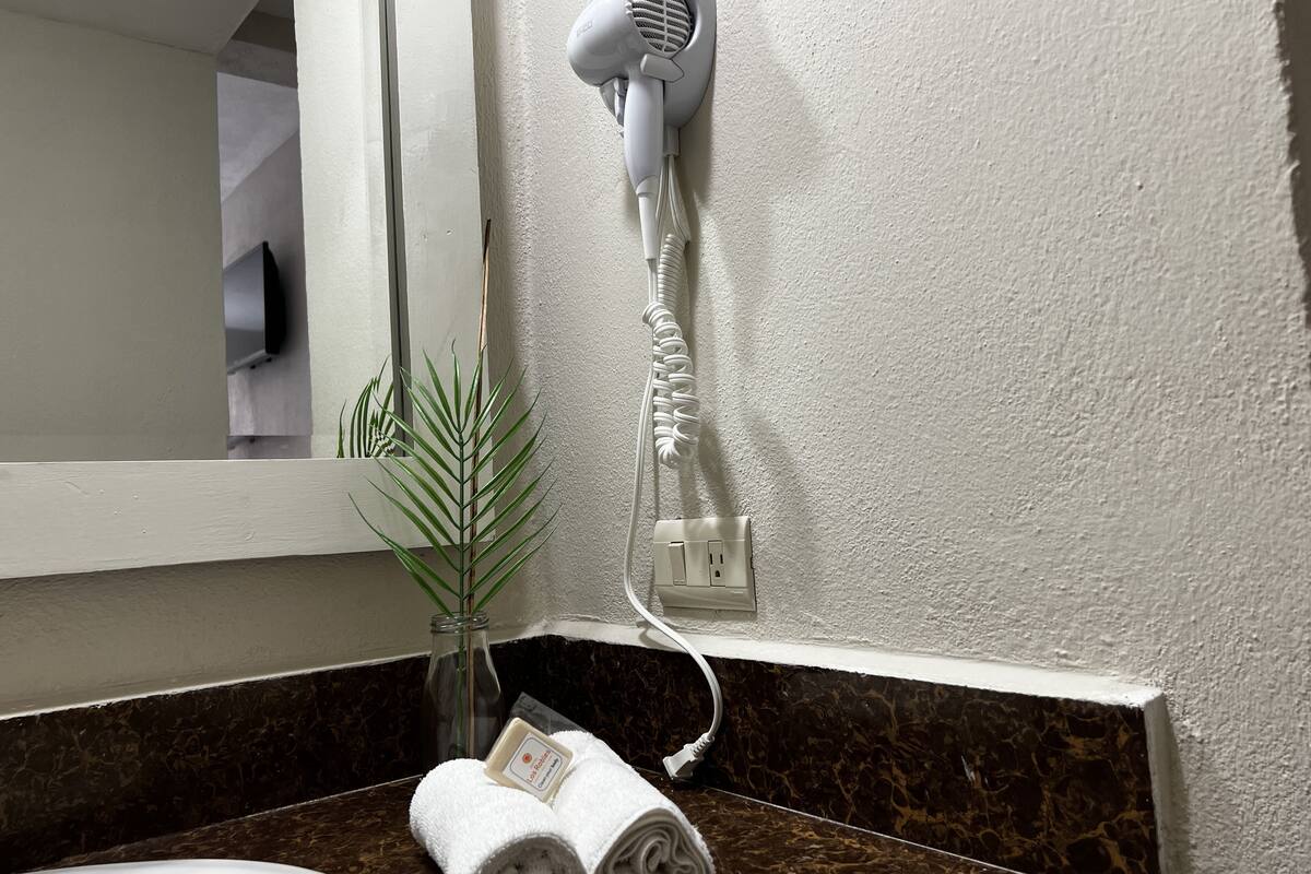 standard double room, 2 queen beds | bathroom | shower, towels