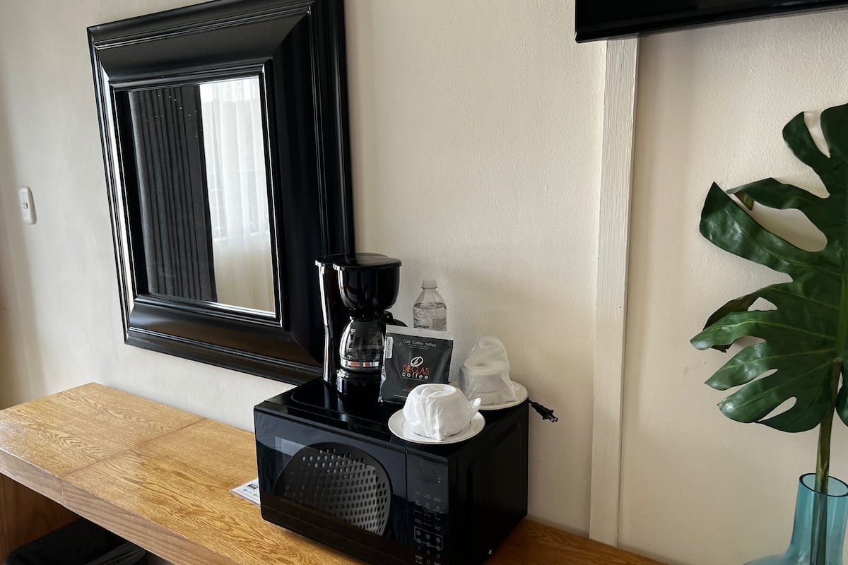deluxe double room, 2 queen beds | 1 bedroom, desk, laptop workspace, free wifi