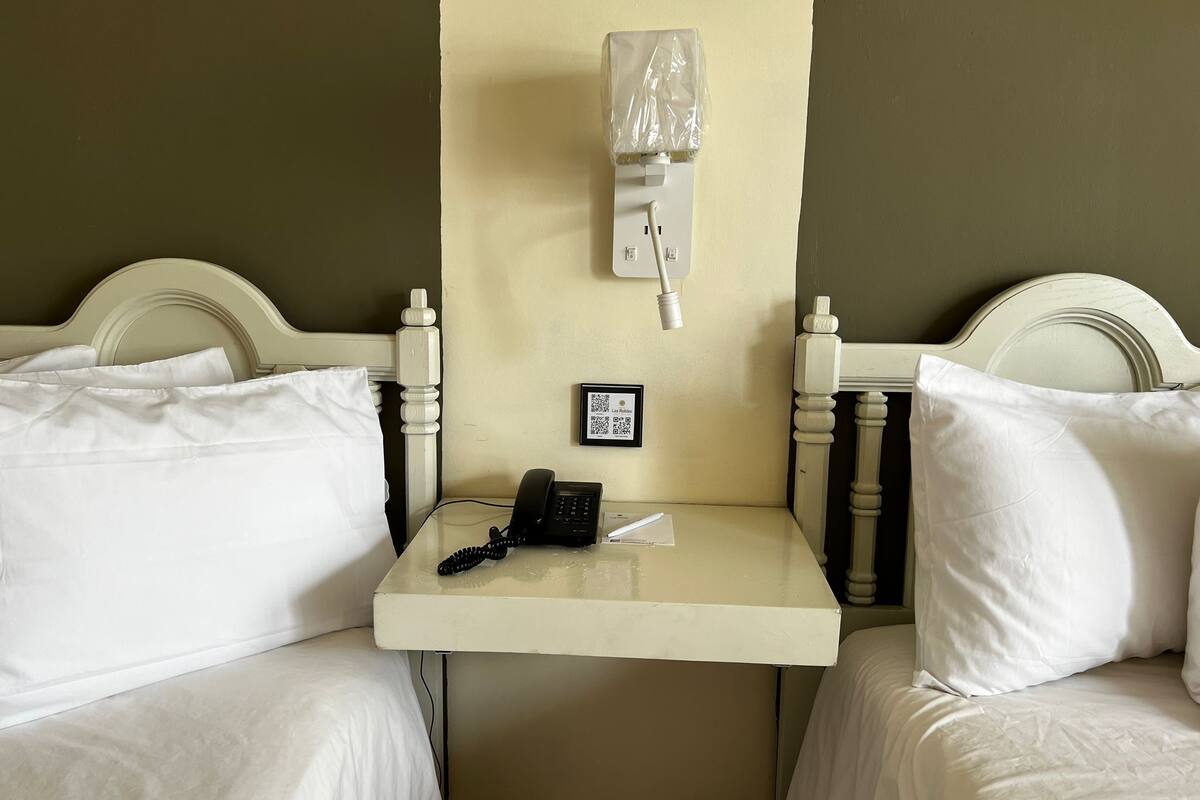 deluxe double room, 2 queen beds | 1 bedroom, desk, laptop workspace, free wifi