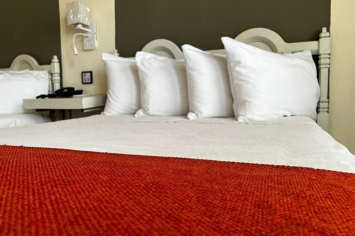 deluxe double room, 2 queen beds | 1 bedroom, desk, laptop workspace, free wifi
