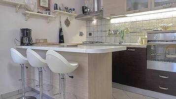 Plaque de cuisson, lave-vaisselle, cafetière/bouilloire