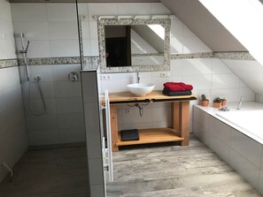 Shower, hair dryer, towels, soap