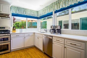 Fridge, microwave, dishwasher, coffee/tea maker