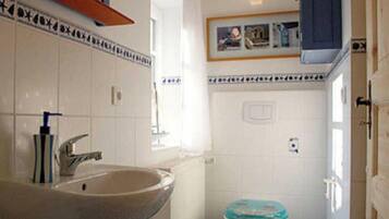 Douche, sĂšche-cheveux