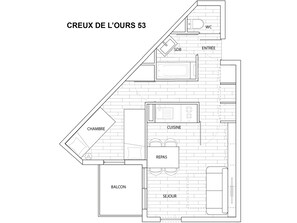 Pianta degli interni di una casa con stanze indicate: cucina, sala da pranzo, soggiorno, bagno e balcone.