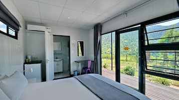 Minibar, desk, bed sheets