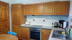 Fridge, coffee/tea maker, electric kettle, toaster