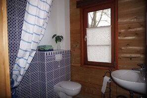 Shower, towels, soap, toilet paper