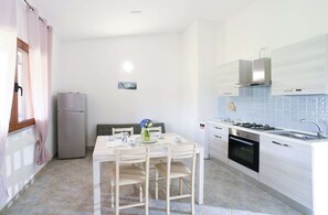 Fridge, oven, cookware/dishes/utensils