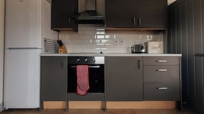 Microwave, dishwasher, dining tables