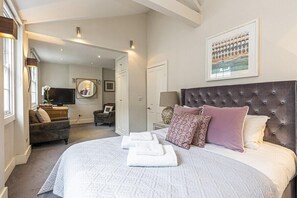 2 habitaciones y tabla de planchar con plancha 