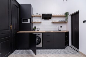 Fridge, microwave, stovetop, coffee/tea maker