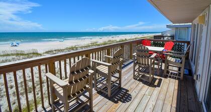 Experience oceanfront bliss at Queen's Grant F-218, a 3-bedroom condo in Topsail Beach.