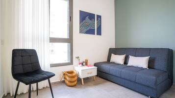 Apartamento | Área de estar | TV de tela plana