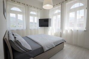 3 dormitorios, tabla de planchar con plancha, wifi gratis y ropa de cama