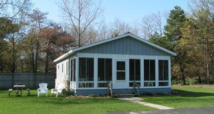 Charming cottage with shared beachfront on Grand Traverse Bay near Northport.