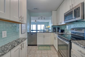Fridge, microwave, oven, stovetop - Ocean Townes One - 3 Bedroom, 2.5 Bath Oceanfront Townhouse with 2 Balconies (Garden City Beach)