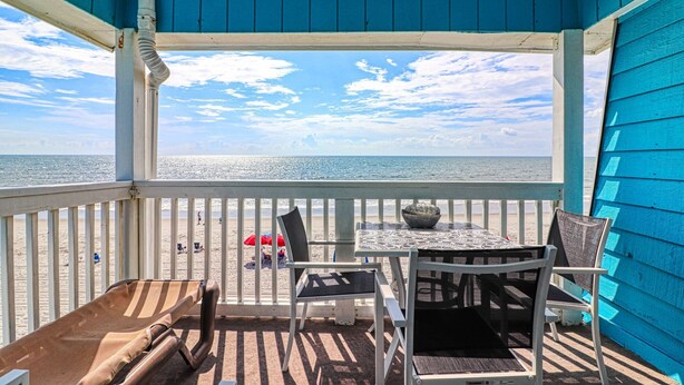 Outdoor dining - Beach House 317, ocean front condo with pool on North Waccamaw Drive (Garden City Beach)