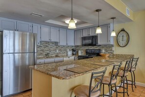 Fridge, microwave, oven, stovetop - Surfmaster 1010 - Two-bedroom, two-bath oceanfront condo (Garden City Beach)