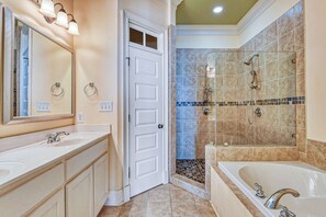 Shower, jetted tub, towels