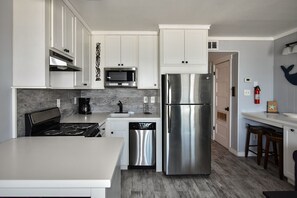 Fridge, microwave, oven, stovetop - Duneside III 304, Oceanfront Condo close to Garden City Pier (Garden City Beach)