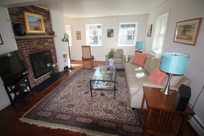 Smart TV, fireplace, DVD player, books