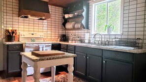 Fridge, microwave, oven, stovetop - A Charming Country Cottage Nestled in the Woods (Hopkins)