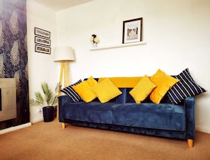 Cottage | Living area | 30-inch TV with digital channels, fireplace - Beachcomber Seafront Pet Friendly Cottage (Prestatyn)