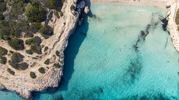 On the beach, white sand, beach volleyball, 2 beach bars