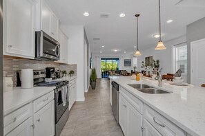 Fridge, oven, dishwasher, coffee/tea maker