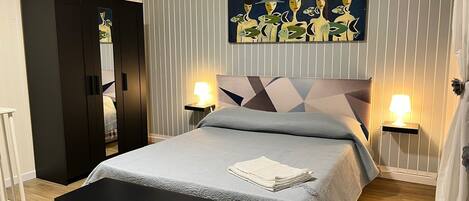 1 chambre, fer et planche Ă repasser, Wi-Fi gratuit, draps fournis