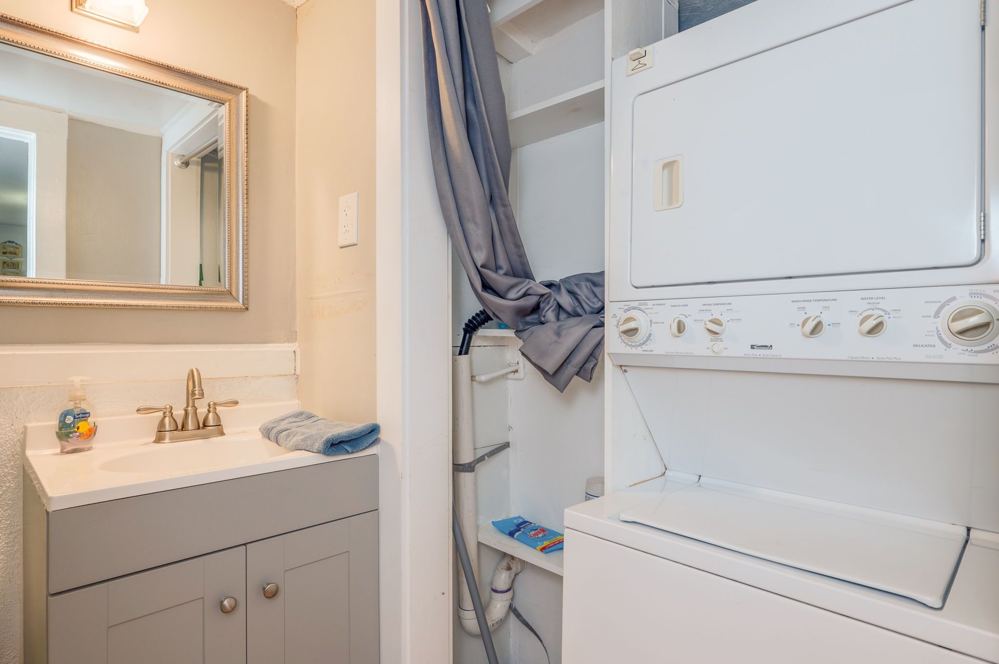 Combined shower/tub, hair dryer, towels, soap