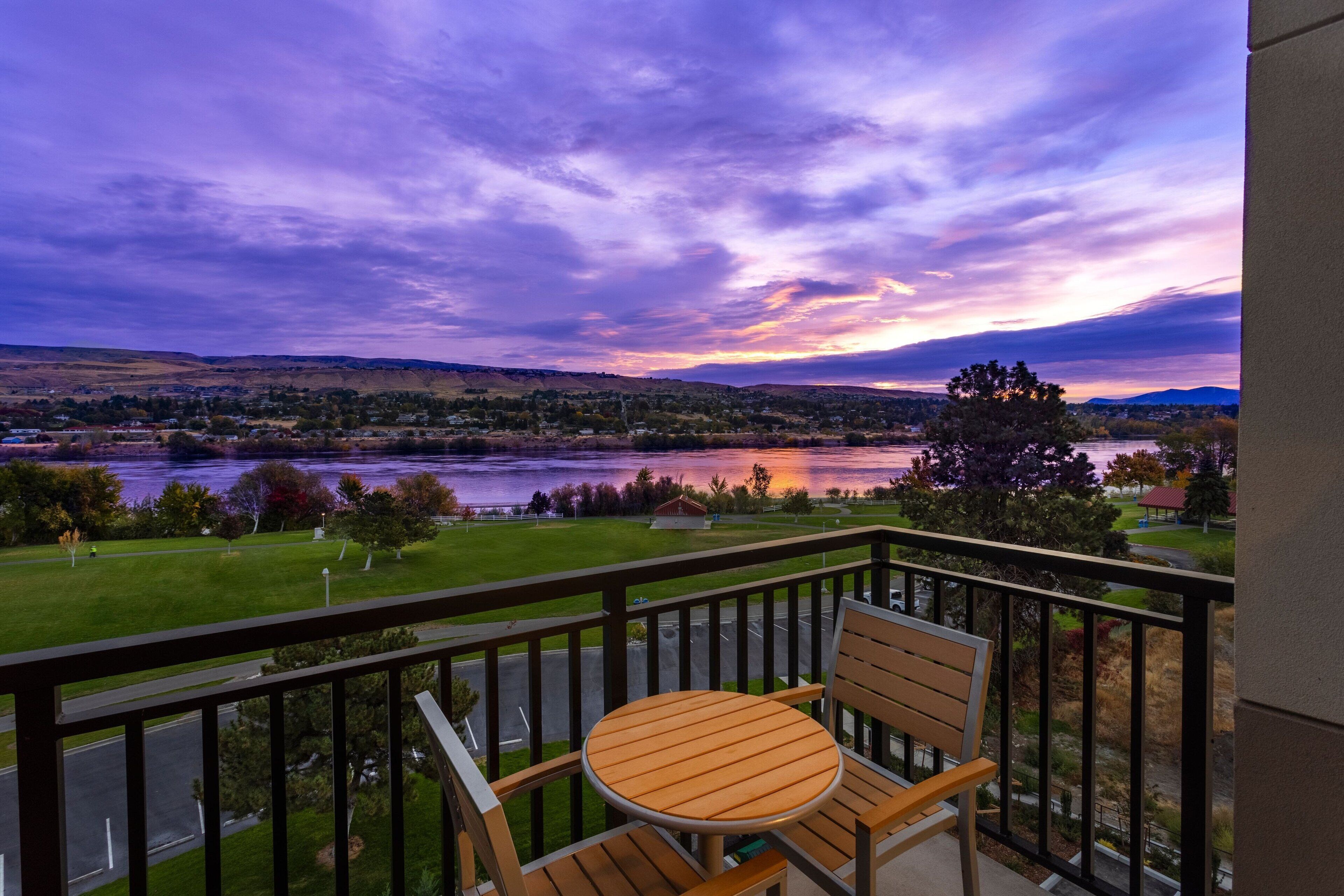 hypo-allergenic bedding, desk, laptop workspace, blackout curtains