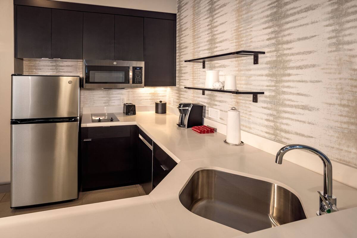 studio suite, 1 bedroom | private kitchen | full-sized fridge, microwave, dishwasher, coffee/tea maker