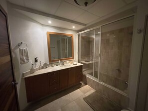 Shower, hair dryer, towels, soap