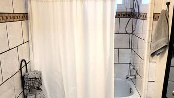 Combined shower/bathtub, hair dryer