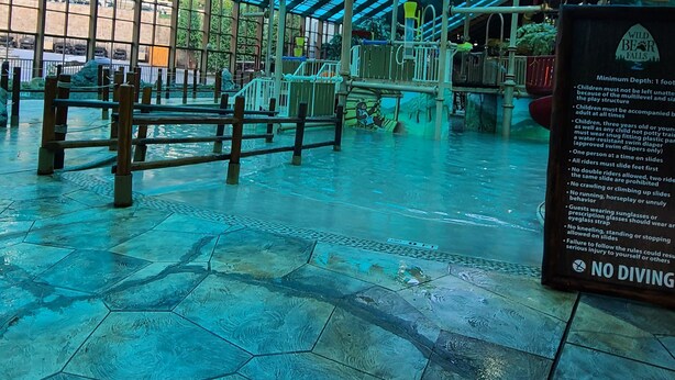 An indoor play area with a glass ceiling, play structures, and a 'No Diving' sign. - Gatlinburg Resort Getaway (Gatlinburg)
