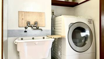 Separate tub and shower, free toiletries, hair dryer, slippers