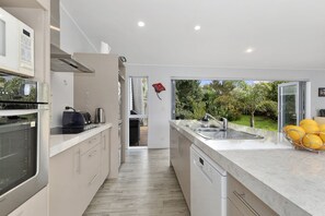 Fridge, microwave, dishwasher, coffee/tea maker