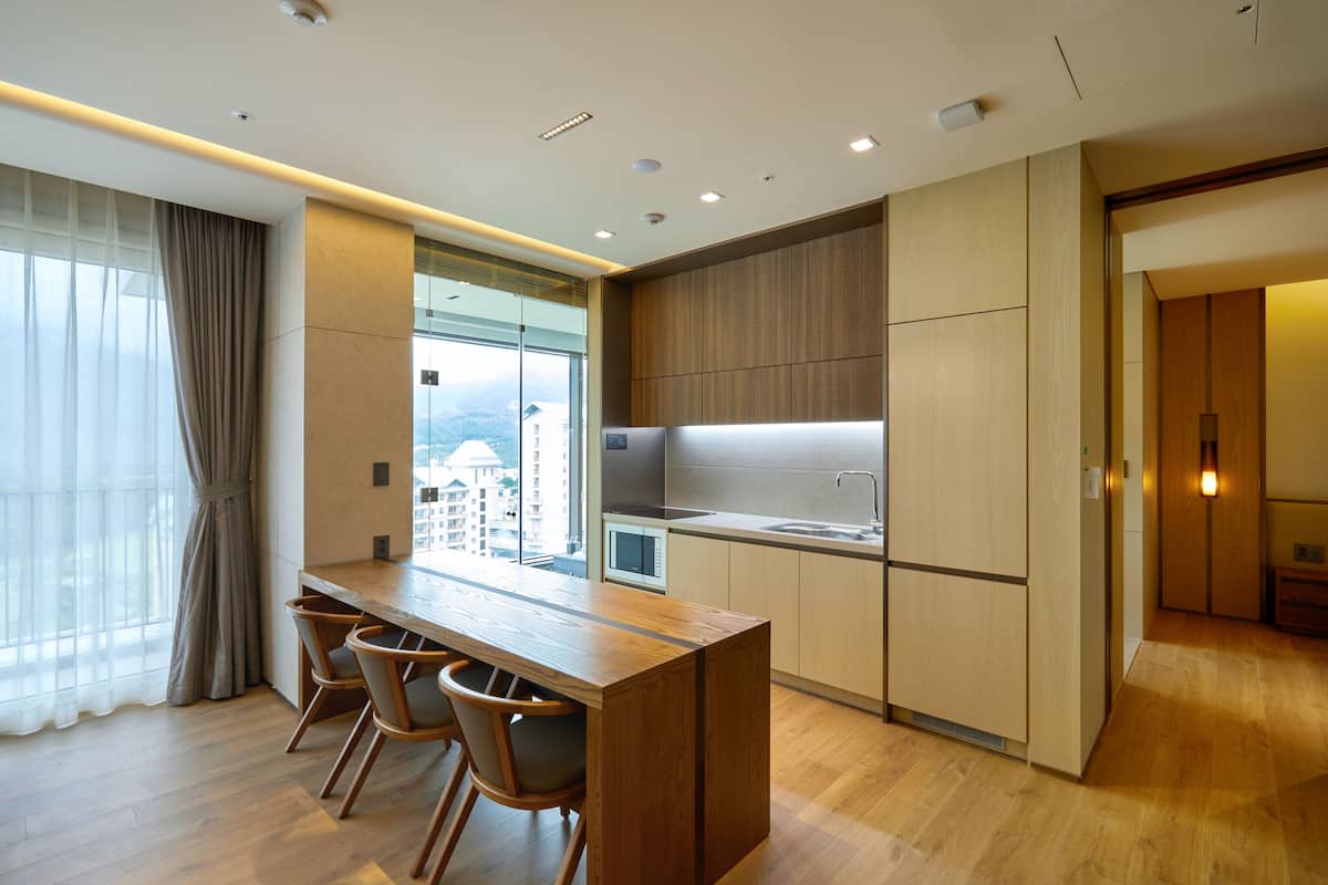 mini-fridge, electric kettle, dining tables