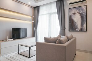 Room | Living area | TV - 2BR Luxury Modern Ciputra International Apartment (Jakarta)