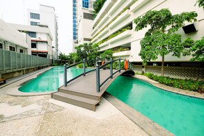 Outdoor pool - Premium and Spacious Studio Apartment at Capitol Park Residence (Jakarta)