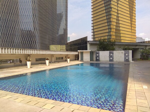 Outdoor pool - Great Choice 1BR at The Empyreal Apartment (Jakarta)