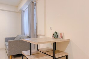 Dining room - Modern 2BR Room at Meikarta Apartment By Travelio (Cikarang)