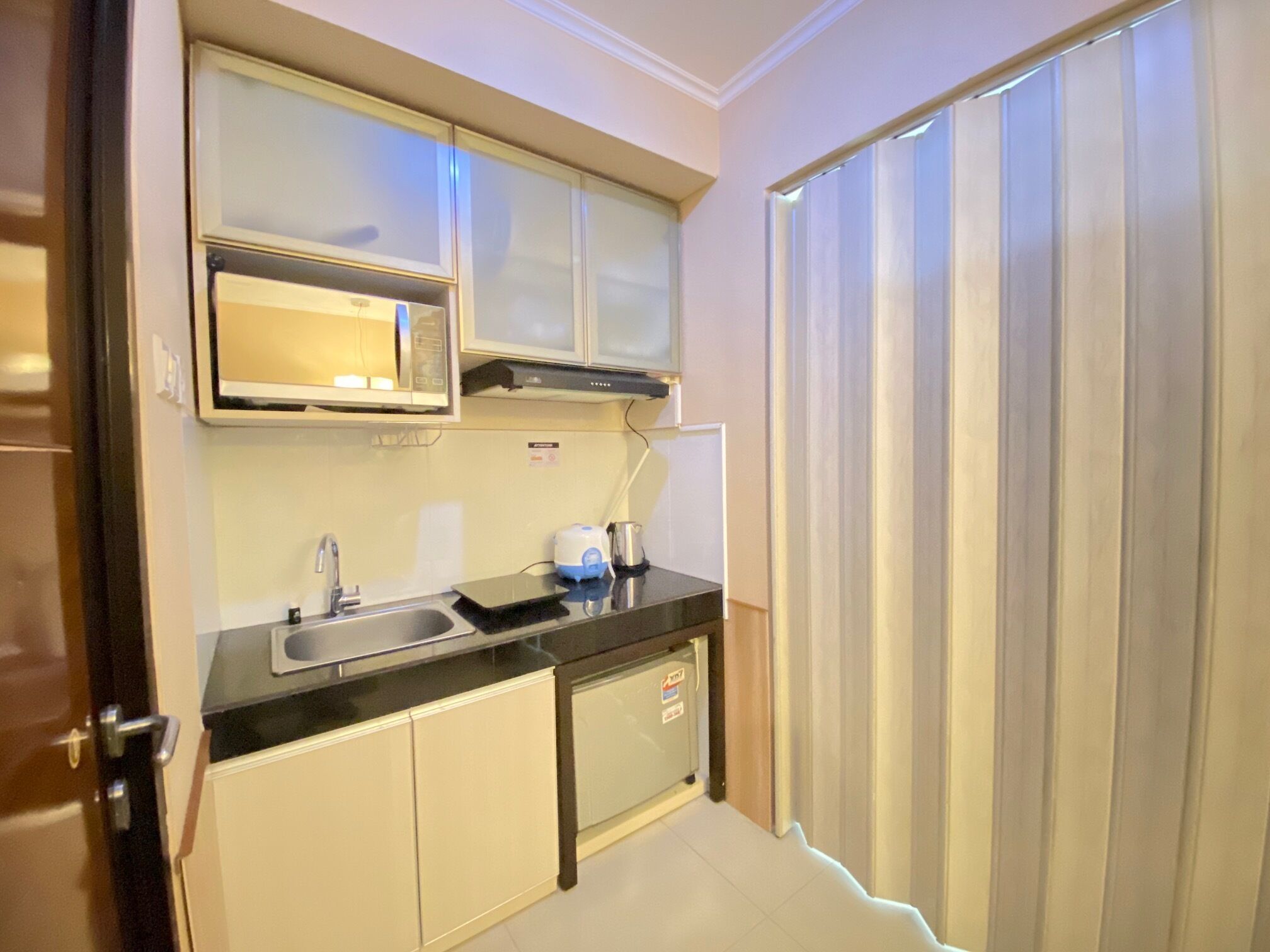 Habitación | Cocina privada | Frigorífico, placa de cocina, lavavajillas y utensilios de cocina