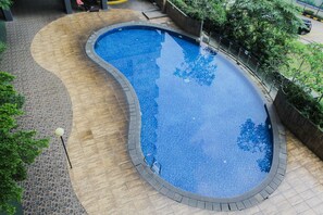 Outdoor pool - Cozy Stay 1BR Serpong Greenview Apartment (South Tangerang)