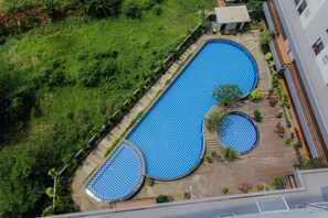 Outdoor pool - Unique and Fresh 2BR Parkland Avenue Apartment (South Tangerang)