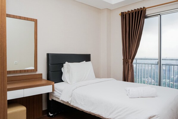 Room | 2 bedrooms, bed sheets - Comfortable 2BR Apartment at Springwood Residence (Tangerang)