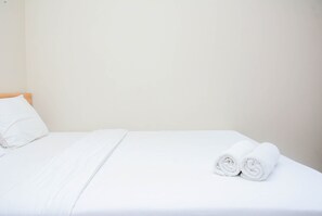 Desk, bed sheets - Relaxing Studio at Springlake Summarecon Bekasi Apartment (Bekasi)