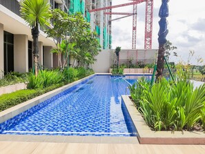 Outdoor pool - Brand New & Super Comfy 1BR Marigold Nava Park Apartment (Pagedangan)